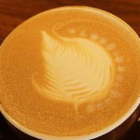 Latte · Espresso with velvety smooth texturized milk.