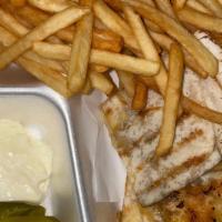 Toshka With Fries · Grilled pita bread stuffed with spiced ground beef and mozzarella cheese. Served with french...