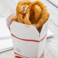 Onion Rings · Thick crispy onion rings, deep fried until golden brown.