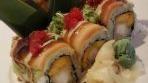 Magic Roll · shrimp tempura & mango inside, topped with sliced avocado, smoked salmon, scallions, red cav...