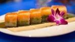 Limestone Roll · lobster salad & avocado layered with sushi rice, topped with salmon and spicy house kimchi s...