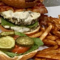 The Big Jack Burger · Two classic 8oz burgers with extra bacon, pepper jack cheese, and topped with onion ring. Se...