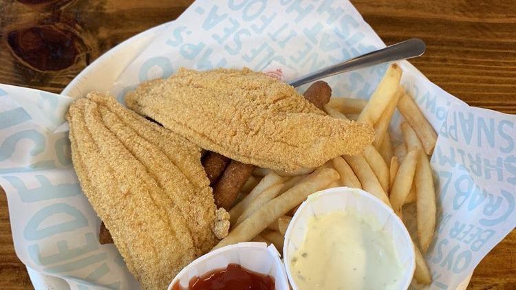 Fried Fish · Fried white fish filet with cajun seasoning and your choice of side.