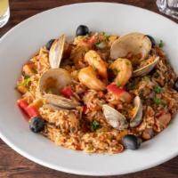 Seafood Rice (Arroz De Marisco) · Our paella-style seafood rice features shrimp, mussels, squid and a littlenecks mixed in wit...