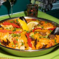 Valenciana · Chicken, chorizo, shrimp, mussels, clams and artichokes.