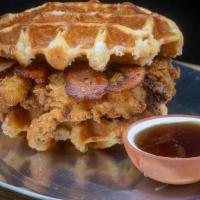 Chicken & Waffle Sandwich · Crispy Fried Chicken, Thick Cut Candied Peppercorn Bacon, Hot Honey Butter, Maple Syrup, Waf...