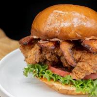 Club Chicken Sandwich · Crispy Fried Chicken, Thick Cut Bacon, Lettuce, Tomato, Confit Garlic Aioli