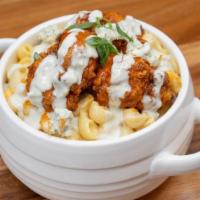 Buffalo Mac · Mac, Crispy Buffalo Chicken Bites, Blue Cheese Crumbles & Dressing