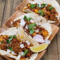 Chorizo & Potato Tacos · House Made Chorizo, Potato, Onions, Cilantro, Cotija