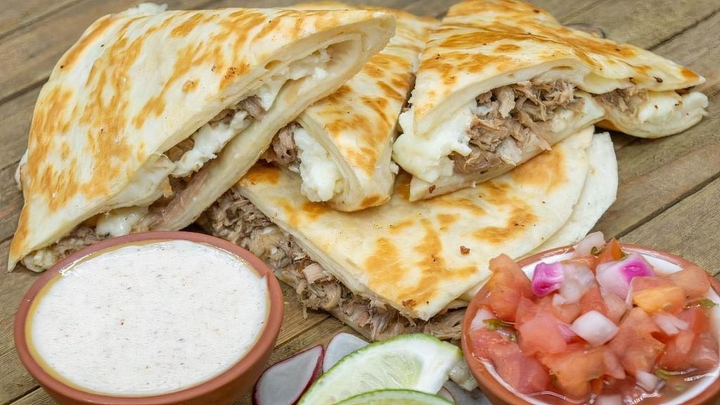 Quesadilla Carnitas · Queso Fresco, Mozzarella, Salsa Fresca, Chile Crema, Carnitas