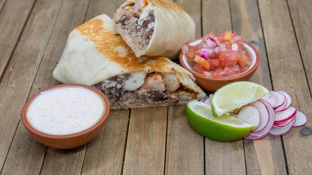 Burrito Tajin Shrimp · Cilantro- Lime Rice, Black Bean Refritos, Queso Fresco, Chile, Crema, Cilantro, Tajin Shrimp