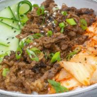 Bulgogi Rice Bowl · Korean BBQ Brisket, Cucumbers, Kimchi, Sesame Seeds, Scallions