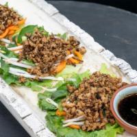 Chicken Lettuce Wraps · Minced Chicken, Fish Sauce, Pickled Carrots, Bean Sprouts, Green Leaf Lettuce