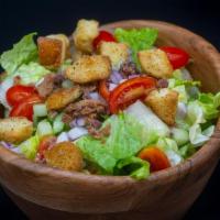 Chopped Salad · Chopped Romaine & Iceberg, Tomatoes, Cucumbers, Bacon, Red Onion, Croutons, Creamy Avocado D...