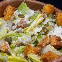Dando Caesar Salad · Chopped Romaine Hearts, Toasted Pepitas, Cornbread Croutons, Cotija, Avocado Caesar Dressing