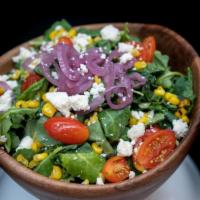 Baby Kale Salad · Baby Kale, Queso Fresco, Heirloom Grape Tomato, Roasted Corn, Pickled Red Onion, Chipotle Bu...