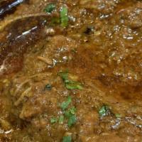Goat Rogan Josh · Fresh goat pieces cooked with ginger, garlic, yogurt, and special blend of Indian spices