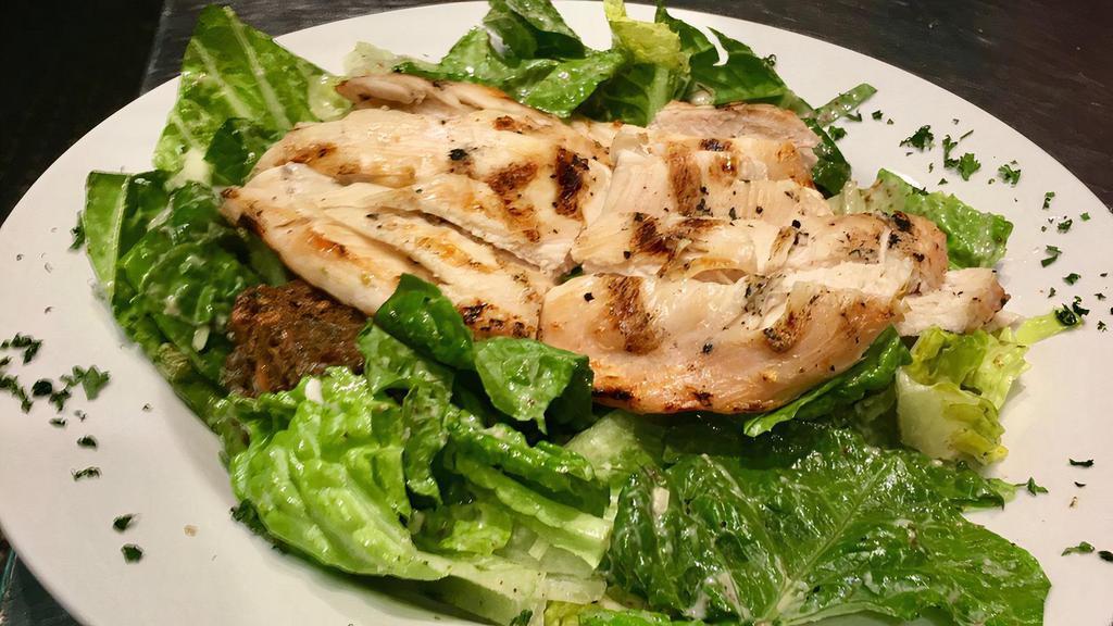 Chicken Caesar Salad · Organic Grilled Chicken over tossed Organic Romaine-Parmesan-Vegan Caesar & GF Oasis Croutons.