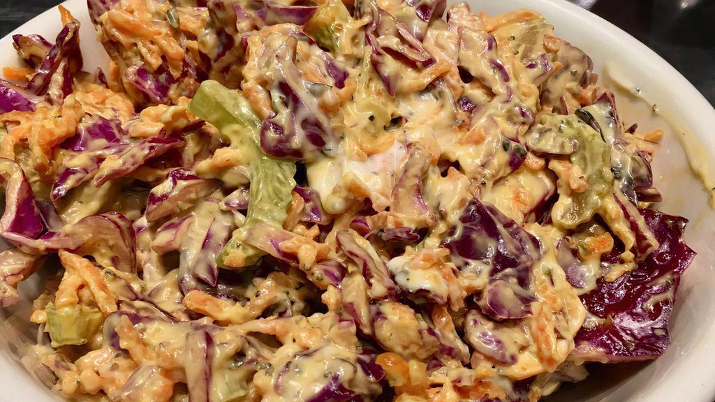 Coleslaw · Organic cabbage, carrot, celery with a vegenaise dressing.