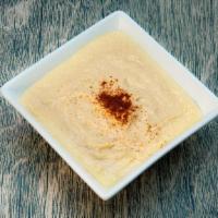 Hummus · Mixture of mashed chickpeas, tahini sauce, lemon juice, fresh garlic and olive oil