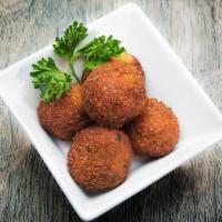 Falafel · Fried chickpea patties, served with tahini sauce