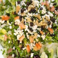 Mediterranean Salad · Mixed greens and iceberg lettuce, tomatoes, onions, raisins, chopped parsley, walnuts and cr...
