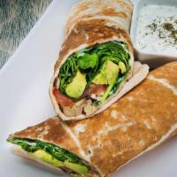 Veggie Delight Sandwich · Fresh avocados, provolone cheese, mushrooms, tomatoes, spinach and mayo, wrapped in fresh pi...
