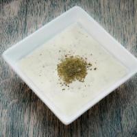 Large Must-O Khiyar · Yogurt mixed with chopped cucumbers and fresh herbs
