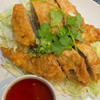 Angel Wings · De-boned chicken wings, stuffed with minced pork, spice, bean thread noodles and cabbage. Ba...