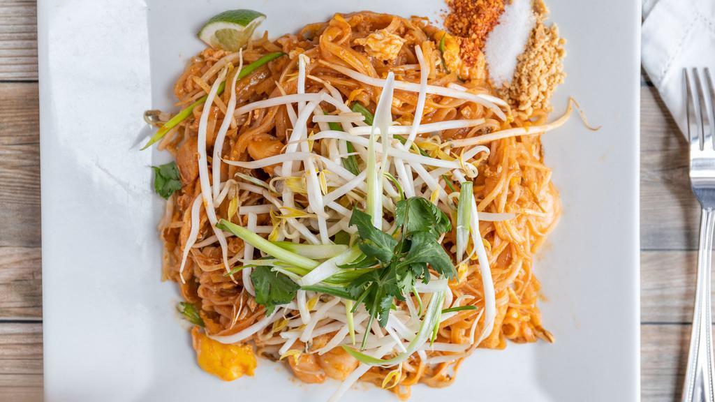 N-1. Pad Thai · Thin rice noodles stir-fried with shrimp, chicken, eggs, bean sprouts, green onions and chilies topped with ground peanuts.
