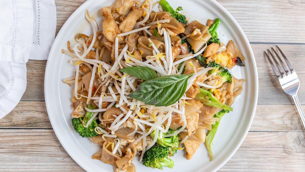 N-6. Drunken Noodles · Stir-fried flat noodles with broccoli, eggs, chilies and basil.