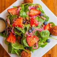 Spinach & Goat Cheese Salad · Organic baby spinach, apples, pickled red onion, figs, candied walnuts, fried goat cheese ba...