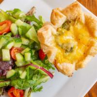 Quiche Du Jour · Served with small house salad.