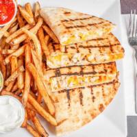 Chicken Quesadilla · Most popular. Fresh grilled chicken with monterey jack and Cheddar cheeses served with sour ...