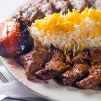 #18. Kabob-E-Soltani · Combination of skewered tenderloin of beef and skewer of ground beef. Cooked over open fire.