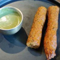 Seekh Kebab. · Minced lamb and house blend of spices.