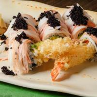 Black Angel Roll · Shrimp tempura and avocado inside, topped with crabmeat and black tobiko.