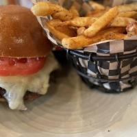 East Falls · grilled onion, tomato, sharp cheddar, remoulade, greens.