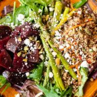 Roasted Beet Salad · Gluten-free, vegetarian. Asparagus, quinoa salad, greens, pistachios, vinaigrette.  With goa...