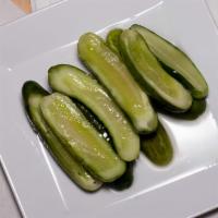 Pickles · 6 spears of half sour pickles for a side order.