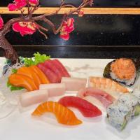 Sushi & Sashimi Combo · Assorted fillets of sliced raw fish 13 pcs, 1 California roll, one spicy tuna hand roll.