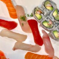 Sushi Deluxe · Assorted fillets or sliced raw fish on vinegar rice, nine pcs and one tuna or California roll.