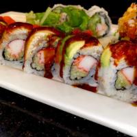 Dragon Roll · Cooked in: crab meat, cucumber top: eel avocado, tobiko.