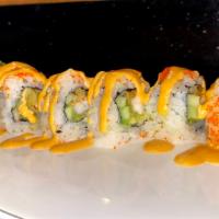 Mexican Roll · Cooked shrimp tempura, avocado, cucumber inside. Topped with spicy mayo and tobiko.