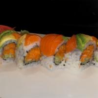Sunrise Roll · Spicy crunchy salmon and cucumber inside. Topped with fresh salon and avocado.
