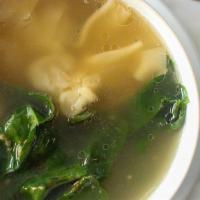 Miso Soup · Japanese style soybean paste soup with tofu, seaweed and scallions.