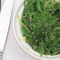 Seaweed Salad · Seasoned seaweed salad topped with tobiko (fish egg).