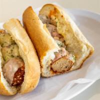 Meatball Sub · Topped with homemade meatballs and classic cheese.