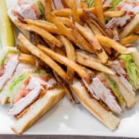 Homemade Turkey Club · Comes with bacon and choice of bread with lettuce, tomato, mayo, coleslaw and pickle. Served...