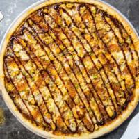 Boom Boom Bbq Pizza  · Barbecue sauce, juicy chicken, mozzarella, marinara, chopped garlic, fresh basil, and extra ...